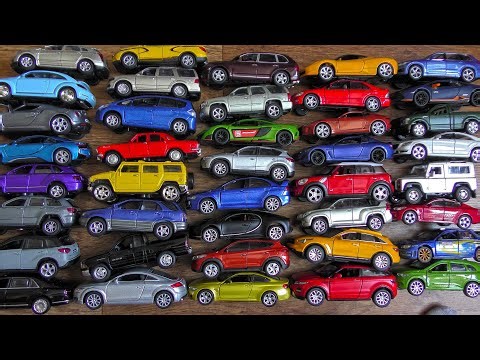 Huge Number of Cars Reviewed in Hands With Brand Names and Logos in 4k