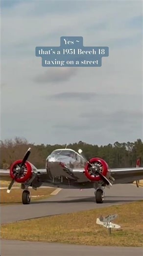Beech 18 Taxiing on a Street at an Airpark | 1951 Vintage Twin Engine Airplane