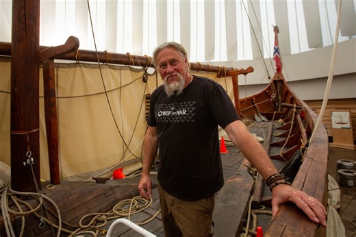 Ship rigger replacing ropes on Moorhead’s Hjemkomst Viking ship