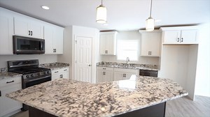 Welcome Home Kory and Kristin. Custom Katelyn floor plan design. Visit us at www.trinityhomebuilderswi.com for information about building your new home with The Trinity Team. | Trinity Homes