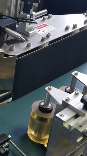 Pack Leader USA on Instagram: "Thin cans. Full wrap. Clean results. This system applies wrap-around labels smoothly and consistently — even on slim cylindrical containers. Precision you can see."