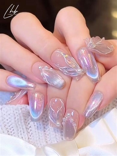 Luvher Beauty Gel Polish on Instagram: "Feminine & ethereal, with simple steps! ✨🧚 Sheer nude base + pastel holographic pigment + delicate fish tail pattern Perfect for romantic outfits and daily wear! ✨ 🛍️ Shop Our Nail Essentials: ✈ Free Shipping on Orders $39+ ⚡ 20% OFF with Code: LUV20 🛒 www.luvherbeauty.com 📲 Follow us for more nail inspo: 📸 Instagram: @luvher_beauty 🎵 TikTok: @luvherbeauty_usa 📘 Facebook: @LuvherBeautyNails #CatEyeNails #MagneticNails #NailTutorial #NailArtIdeas #Na