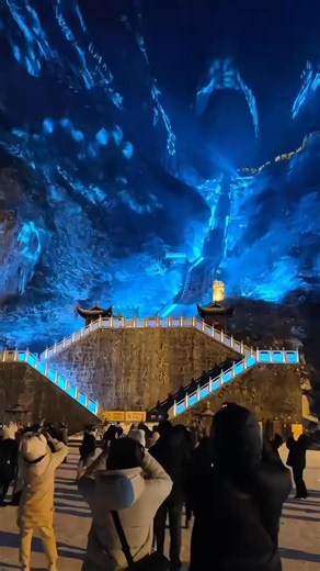 📍Zhangjiajie Tianmen Mountain Light Show ✨ Experience the magic of nature and light at Tianmen Mountain! As night falls, the stunning cliffs and Tianmen Cave glow with vibrant lights 🌟 #china #hunan #zhangjiajie | HiChina Travel