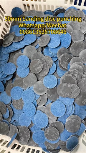 Sanding disc punching machine.