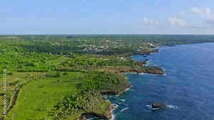 Flying over Boca de Yuma jagged coastline in Dominican Republic. Aerial forward