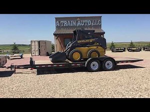 skid steer loading on gravity tilt trailer