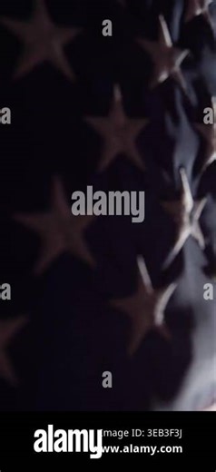 Vertical video of a real American flag close-up. Fresh unfolded flag of the United States of America waving slowly in bright light Stock Video Footage - Alamy