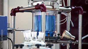 Close up of process in lab reactor. Lab reactors are used for optimizing and reproducing chemical reaction, mixing, dispersing, and homogenization processes.