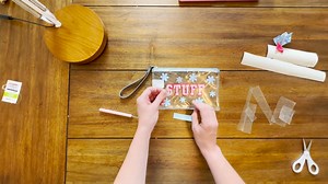 Join Laura as she shows you how to make a Stuff Pouch using Adhesive...