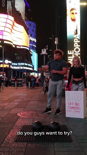Unliftable Thomas Inch Dumbbell Challenge in Times Square