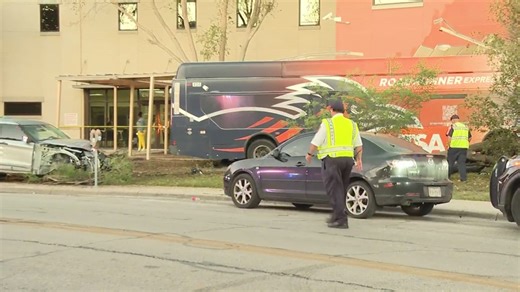 VIA bus hits parked car in downtown San Antonio; driver hospitalized