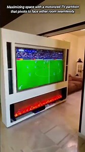The Ultimate Pivoting Hidden TV Room Divider.