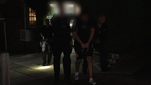 Members of one of Australia's most feared gangs in handcuffs