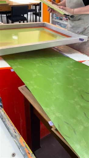 A speedy timelapse on the process of printing the last layer on Home One (2025) which was spiralling twigs taken from a gelli-plate print 🪾🍂 The plastic sheet has been printed on and taped to the table so that I can line up the paper each time ☺️ #printing #pressure #print #printmaking #repeatpattern #silkscreen #screenprinting #process #handprinting #handprinted #art #ink #fern #nature #uniqueprints #texture #wallpaper | Stella Howe