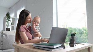 Manager ceo lady sit sofa use netbook maternity leave hold baby indoors
