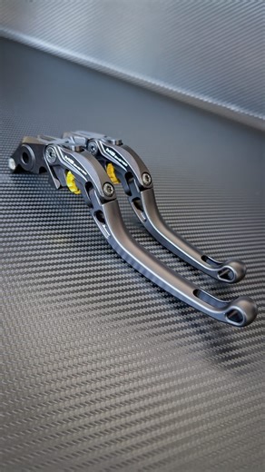 MG Biketec on Instagram: "Engineered elegance. No compromises. Available in short and long versions, finished in deep black anodizing for a timeless, premium look. ✨ more than 20-step precision adjustment (up to 25 mm range) 🎨 Refined adjustment dials in Black, Gold, Blue, Red, Matte Silver & Orange 🔁 Foldable design – subtle protection, intelligent engineering ⚙️ CNC-machined from high-strength AW 6082 aluminum 📜 TÜV approved for legal street use 🇦🇹 Made in Austria Not just a lever. A stat