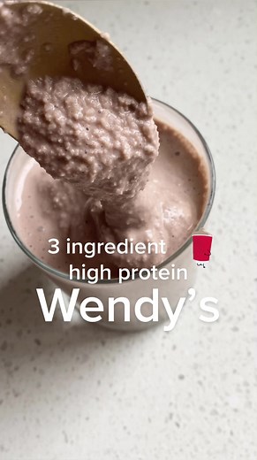 3 Ingredient High Protein Wendy’s Frosty 🍦 Finally got around to trying @aubrey.schoenekase cottage cheese protein shake and oh my goooodness it legit tastes like a Wendy’s frosty 🤯🤯 I added 1/2 cup of cottage cheese instead of 1/4 cup, so one “frosty” has 41g of protein. Insane. I did 1 cup ice, blended up first. Then 1/2 cup cottage cheese, one scoop @PEScience Chocolate truffle (use code BAILEY at checkout to save $$ on all their products), and 1/2 cup almond milk. Blend and inhale! #wendy