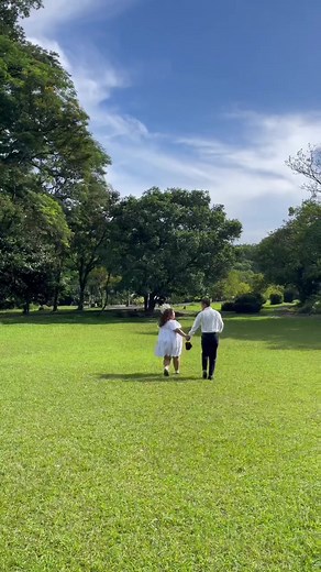 Couple's Romantic Stroll in a Beautiful Park