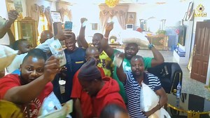 A moment of joy and gratitude 💃🏽🙌 The Adoration Media Team shared a beautiful moment with Rev. Fr. Ejike Mbaka, as he generously blessed us with dollars, rice, and yams. Indeed, when you serve God faithfully, He sends helpers of destiny. Thank you, Daddy, for your fatherly love and blessings ❤️🙏 | Adoration Ministry Enugu Nigeria - AMEN