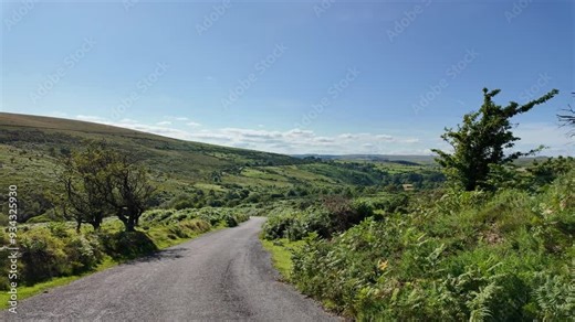 Dartmoor Devon England. 28.07.2024. Video. Driving across Dartmoor along country lane viewing beautiful countryside in summer.