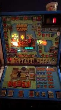 A fiver vs Andy Capp fruit machine