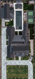 Zero Edge. Infinite Reflection. This pool sits perfectly flush with the deck, a seamless transition that blurs the line between hardscape and water. The result? A mirror-like surface that reflects the architecture, sky, and landscape like glass. Every detail is intentional, from the dark mosaic tile that enhances the reflection, to the precision edge that allows the water to gently spill away. #charmedinchandler | AFT Construction