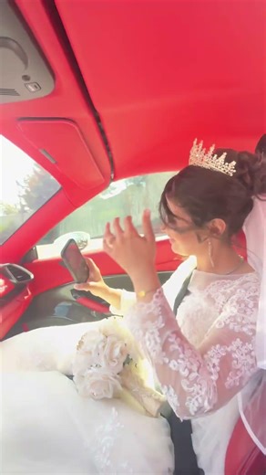 Bride in 🚘#bride#wedding#weddingdress#celebration#cake#ferrari#youtubeshorts#youtube#viral#vlog