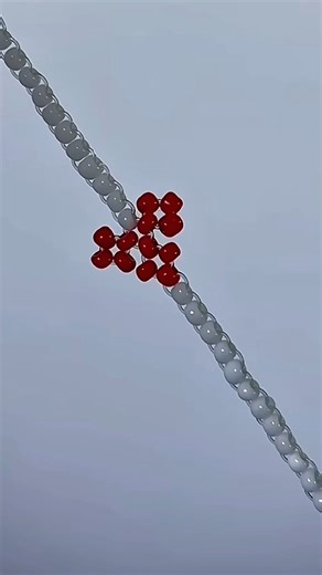 Handmade DIY Beaded Bracelet with a Pop of Red ❤️ #shots #diy #heart #bracelet