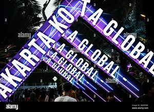 Jakarta, Indonesia. 25th May, 2025. People enjoy the lighting installations at the Jakarta Light Festival 2025 at Lapangan Banteng Park in Jakarta, Indonesia, on May 25, 2025. The Light Festival, themed ''JE KA TE World, '' features various interactive light art installations and video mapping shows projected onto building facades, trees, and the ground as part of the 498th Anniversary celebrations of the City of Jakarta. (Photo by Afriadi Hikmal/NurPhoto)0 Credit: NurPhoto SRL/Alamy Live News S