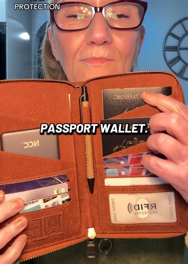 Passport wallet with RFID protection. It holds up to 5 passports, multiple credit cards and room for various documents. Also has a pen & SD card slot & is made from a quality leatherette. Has the option of attaching a carry handle which is supplied.#passportwallet #rfidwallet #RFID #travelhack #travelaccessories