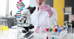 Scientist Holding Tube Working Microscope Laboratory Stock Footage Video (100% Royalty-free) 1086718712 | Shutterstock