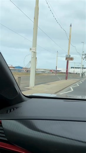 Experience the thrill of a Ferris wheel! See views from a spinning gondola, including other gondolas, the ground below, and the vast ocean. What's your favorite amusement park ride? #FerrisWheel #AmusementPark #OceanView #RideViews #Gondola | Vinny & Ashlee