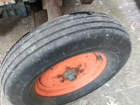Filling tires with water or slime on a tractor. Tube or valve stem type tires.
