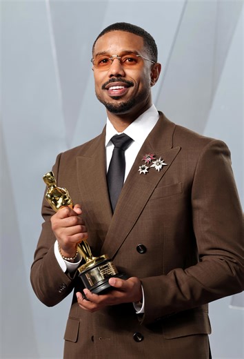 Who really stole the Oscars? Brooches were men's accessory of the night.