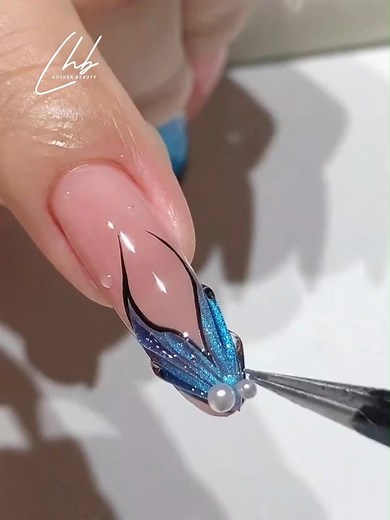 Luvher Beauty Gel Polish on Instagram: "This one’s a showstopper 🎣✨ Say hello to Fishtail Cat Eye Nails—a bold twist with hypnotic magnetic vibes! Watch the full tutorial to master this mesmerizing look 💅🏽💖 🛍️ Shop Our Nail Essentials: ✈️ Free Shipping on Orders Over $39+ ⚡ 20% OFF with Code: LUV20 🛒 Shop Now: www.luvherbeauty.com 📲 Follow Us for More Nail Inspo: 📸 Instagram: @luvher_beauty 🎵 TikTok: @luvherbeauty_usa 📘 Facebook: @LuvherBeautyNails #LuvherBeauty #FishtailNails #CatEyeN