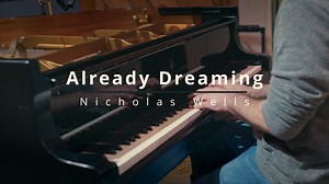 I wrote “Already Dreaming” in March of 2004, when I was 15. I have a vivid memory of picking up my guitar one morning before school (which I didn’t usually do but I felt the inspiration for a song,) sitting down on the edge of the bed, and immediately humming the chorus melody. I then went to school, and when I came home I finished writing the whole song, including in the lyrics some moments from my day. Throughout High School, I used to make little CDs of my home recordings and hand them out to