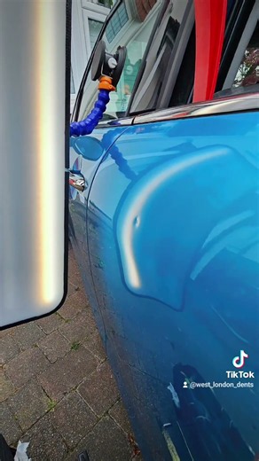 Mini nearside rear quarter panel and nearside rear door paintless dent repair.