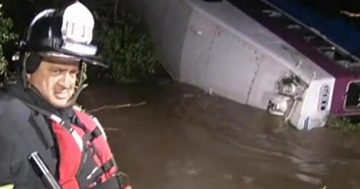 California commuter train derails into rushing water