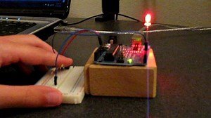 Arduino push-button toggle with debouncing