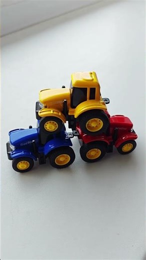 Let's learn prepositions with the red, green, yellow, and blue tractor! #speechdevelopment #prepo...