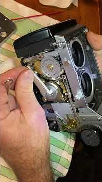 Repair stuck film advance on a Mamiya C33 Professional camera