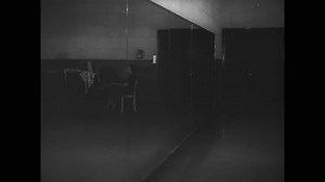 CIRCA 1937 - The Rockettes enter the studio to stretch and rehearse kicks.