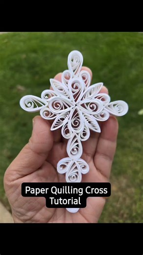 Paper Quilling Cross ✝️ Tutorial Here is the Tutorial of simple paper quilling cross design. For this design I used 10 tear drops , 4 eye shapes and 12 curved teardrops. For teardrops and eye shapes I used same size coils and for curved teardrops I use small size coils.Perfect for gifting, home décor, or adding a handmade touch to your faith-inspired art. 🙏💐 If you try this design, don’t forget to tag me or share your video — I’d love to see your creations! 💖🎥 #PaperQuilling #QuillingCross #