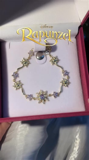 RoyalOraa on Instagram: "I was POURING myself into this art… Disney princess–inspired bracelets bring the magic of beloved characters like Elsa and Rapunzel to life in a way that feels both stylish and enchanting. Each bracelet captures the essence of its princess through carefully chosen colors, charms, and textures. From icy blues that shimmer like snowflakes to warm purples and golds that evoke the glow of lantern light, every detail is designed to reflect the heart of each story. An Elsa-ins