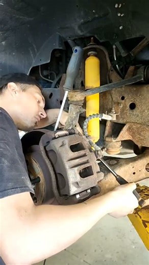 2004 Ford Ranger Front Wheel Hub Replacement Pt.8. Install Caliper, Rotor and Torque Axle Nut. #auto