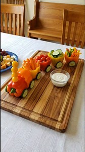 All Aboard the Veggie Express! 🚂 Make snack time a total blast with this adorable bell pepper train! 🫑 Using fresh cucumbers for wheels and vibrant peppers for cars, this healthy display is packed with crunchy carrots and juicy tomatoes. It is a fun and simple way to get everyone excited about eating their vegetables. 🥕✨ #HealthySnacks #FoodArt #KidsNutrition #VeggieTrain #HealthyEating | Mom Tasty