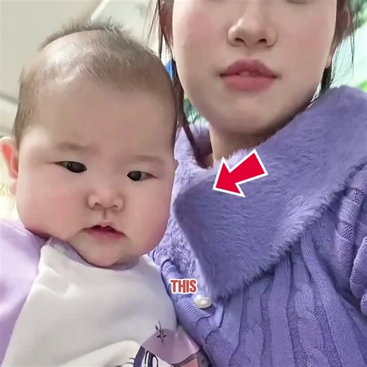 Baby Showing Two Little Teeth