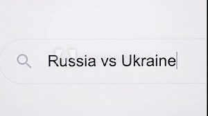 Russia vs Ukraine - Internet browser search bar question typing text with camera movement. Animated headline of typing text Russia vs Ukraine in 4k UHD.