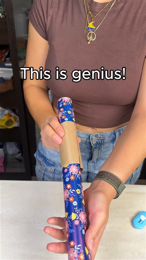 Easy gift wrapping hack! Use this to keep your wrapping paper from rolling away! | Your Everyday Life Hack Diva