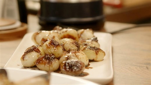 Caramelizing cipollini onions with brown sugar and balsamic